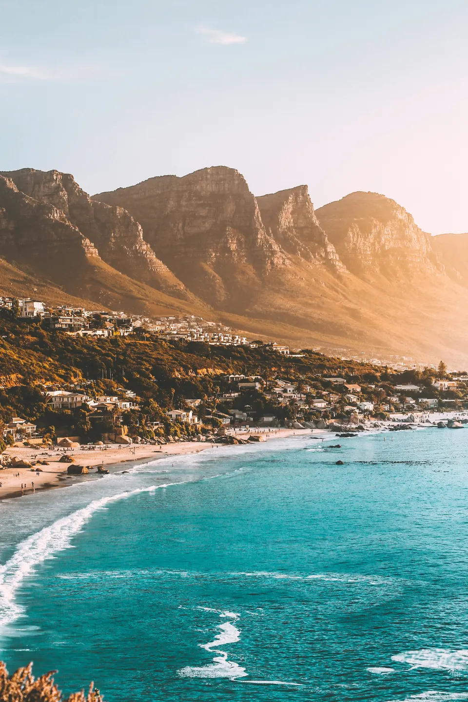 Clifton beach and turquoise Atlantic water below the Twelve Apostles, Cape Town.